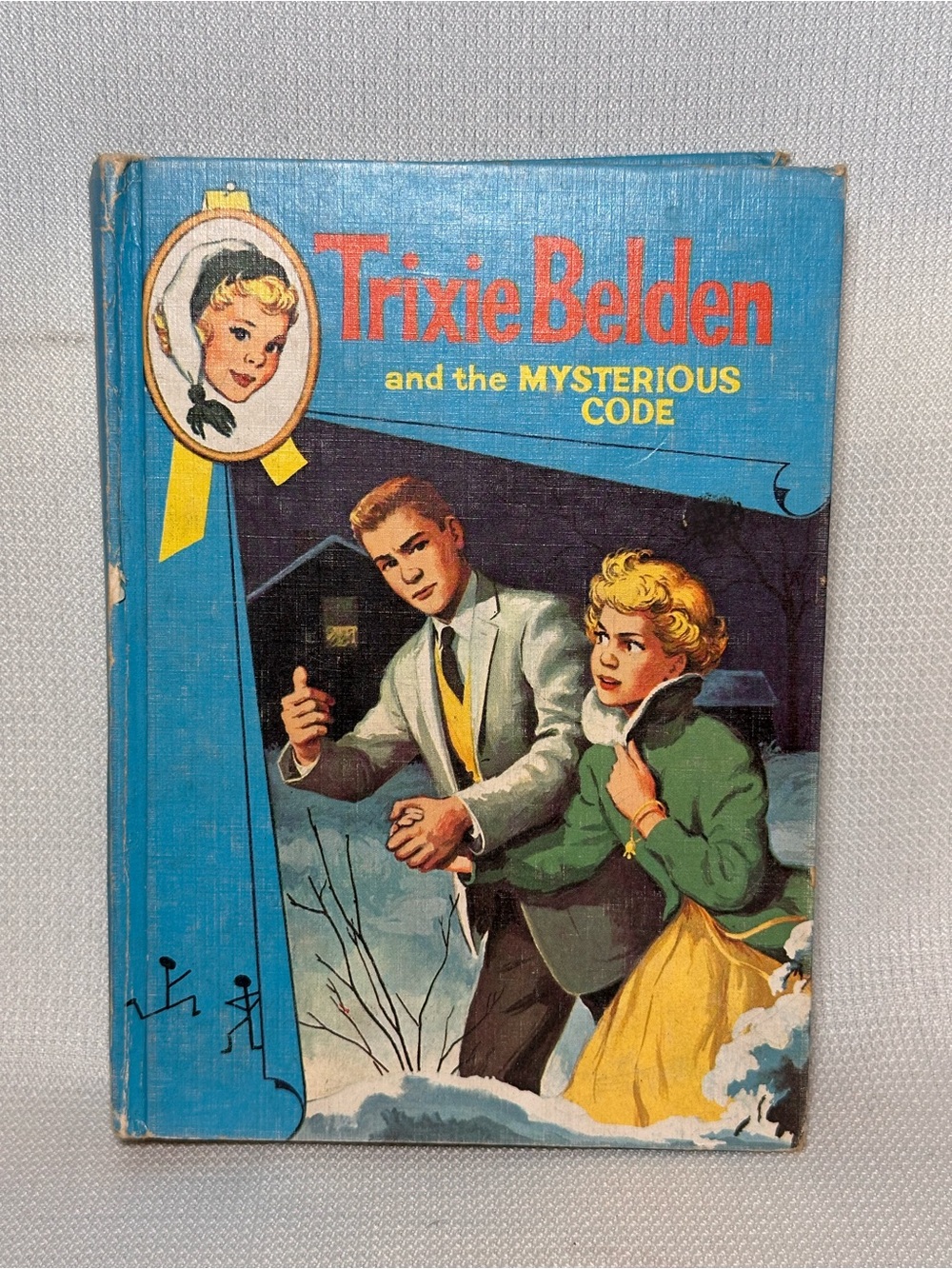 Trixie Belden and the Mysterious Code by Kathryn Kenny - Blue Cover
